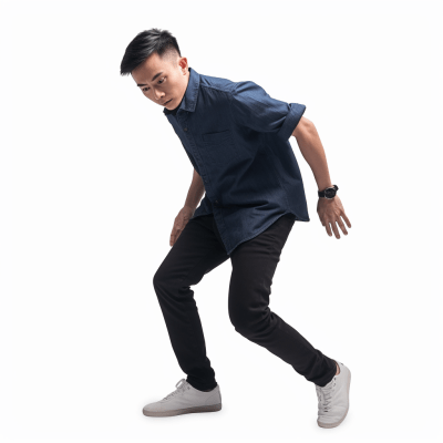 Stunned Filipino male student with short hair in mid-motion pose