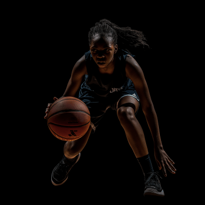 Teenage Black Girl Dribbling Basketball