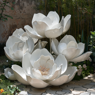 Glossy White Lotus Flowers in a Garden