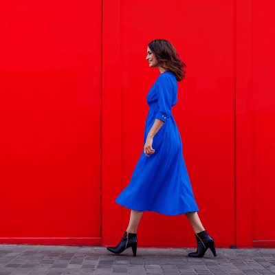 Happy Walking Girl in Blue Dress