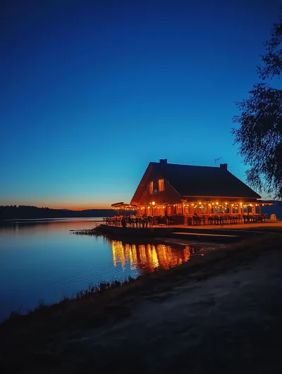 Nighttime Riverbank Restaurant and Lake