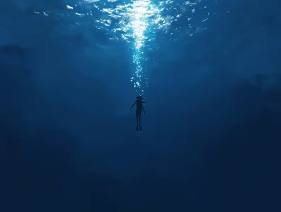 Girl Diving into Deep Sea