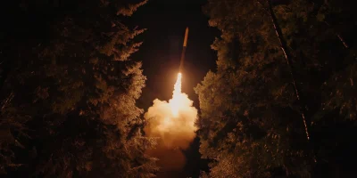 Nighttime Missile Launch in Forest