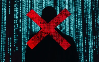 Silhouette of IT Security Professionals with Red X