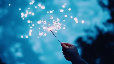 Girl Holding Firework Stick in Blue Tone