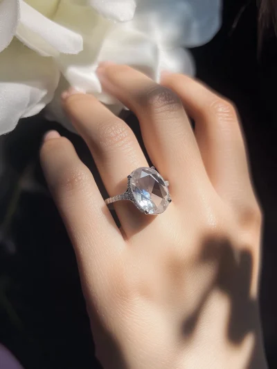 Glittering White Gemstone Ring on a Hand