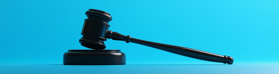 Gavel on Blue Background