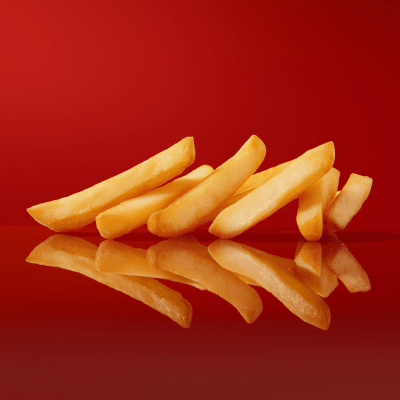 Three Single Fries on Red Background