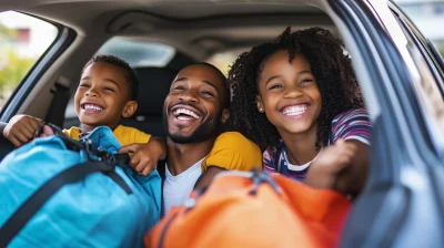 Family Picking Up Rental Car