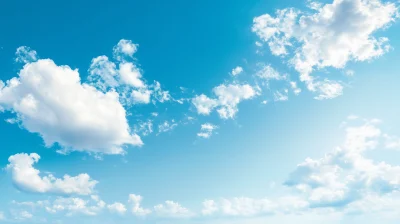 Serene Blue Sky with Fluffy Clouds