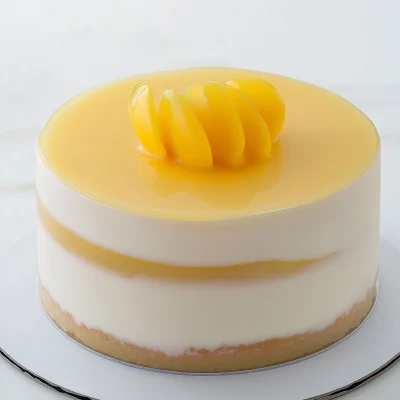 Glossy Mango Colored Ball on Cake