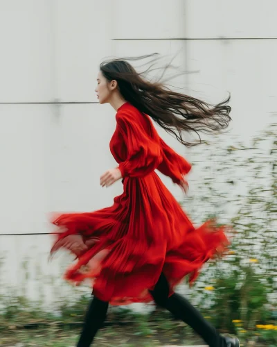 Woman in Red Dress Running