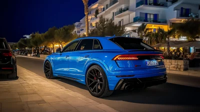 Blue Audi RSQ8 at Night