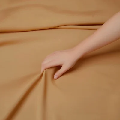 Hand Pulling Beige Fabric