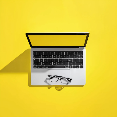 Laptop Mockup with Glasses