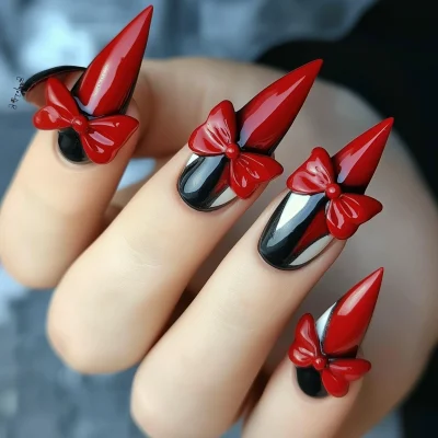 Elegant Pointy Nails with Red Bows