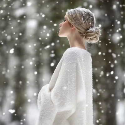 Elegant Woman in Snow