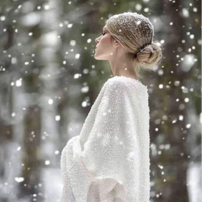 Elegant Woman in Snow