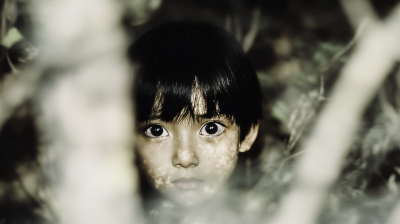 Scared Boy in the Woods
