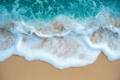 Close Up of Beach Waves and Sand