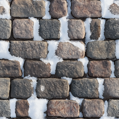 Cobblestone Pathway in Snow