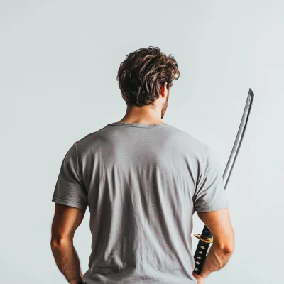 Man Holding Katana