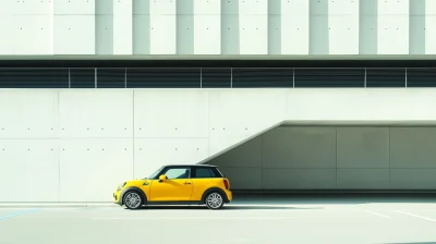 Yellow Mini Cooper in Parking Garage