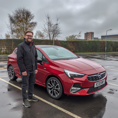 Smiling Man Next to Car